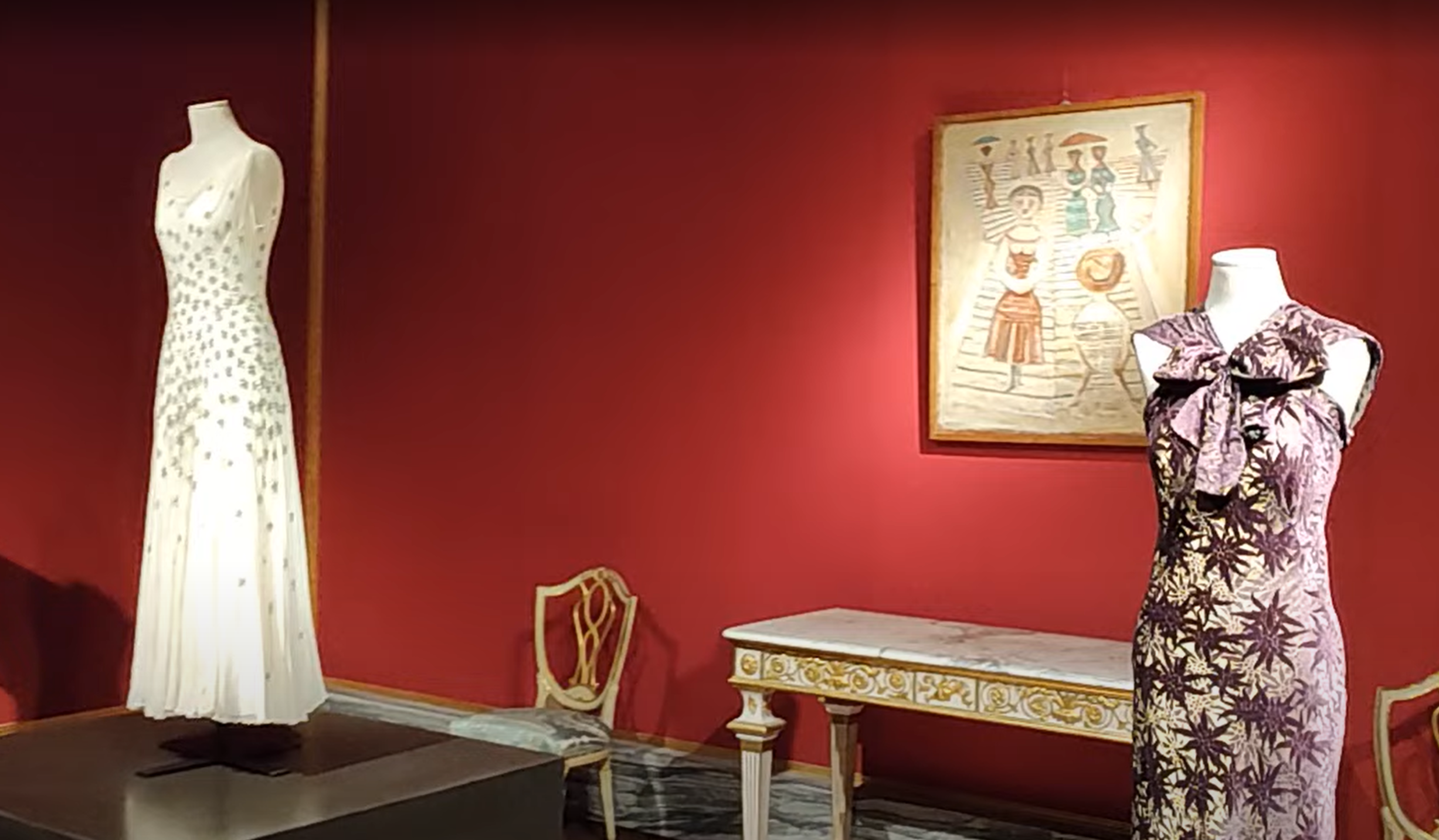 Beaded evening gown and printed silk dress on display at the Museum of Costume and Fashion, Palazzo Pitti