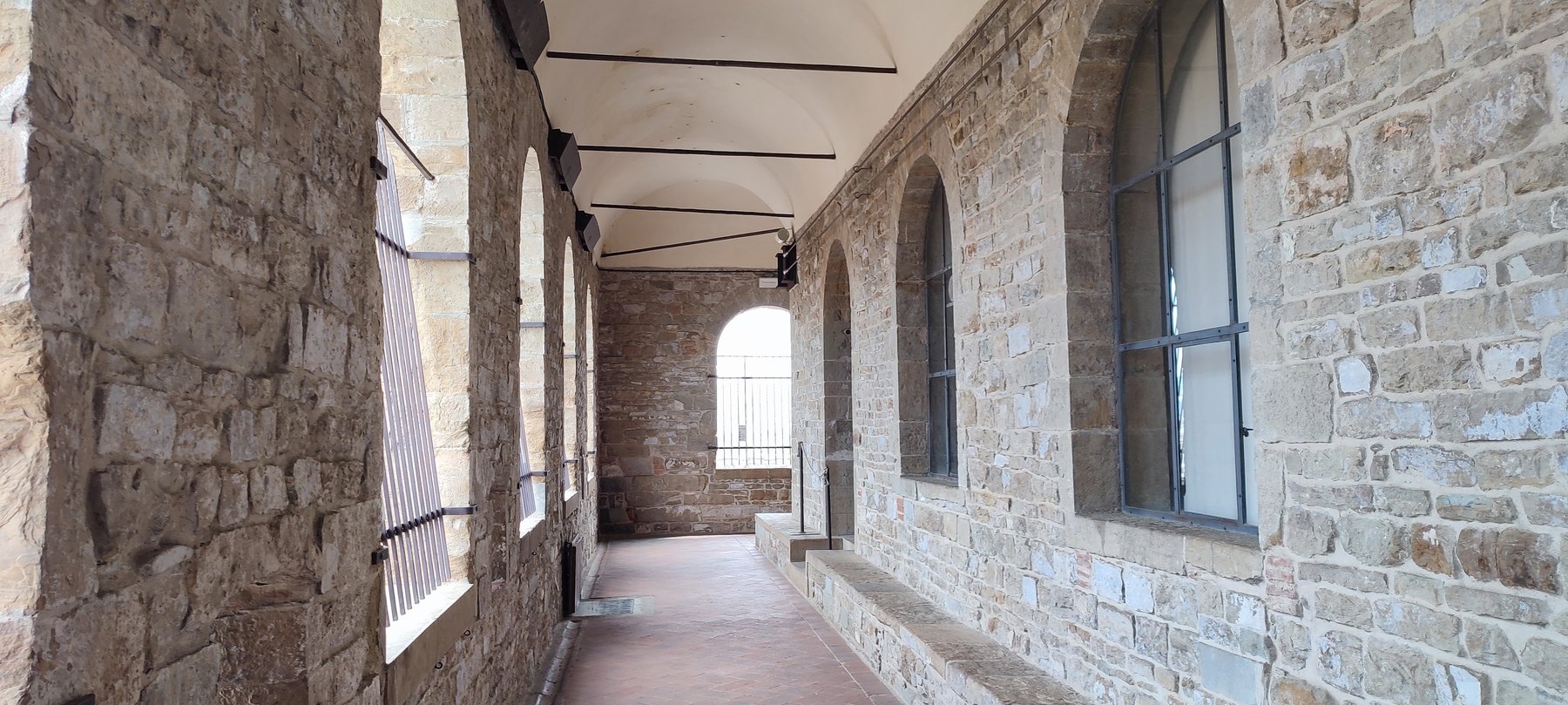 The vaulted medieval walkway inside Palazzo Vecchio in Florence