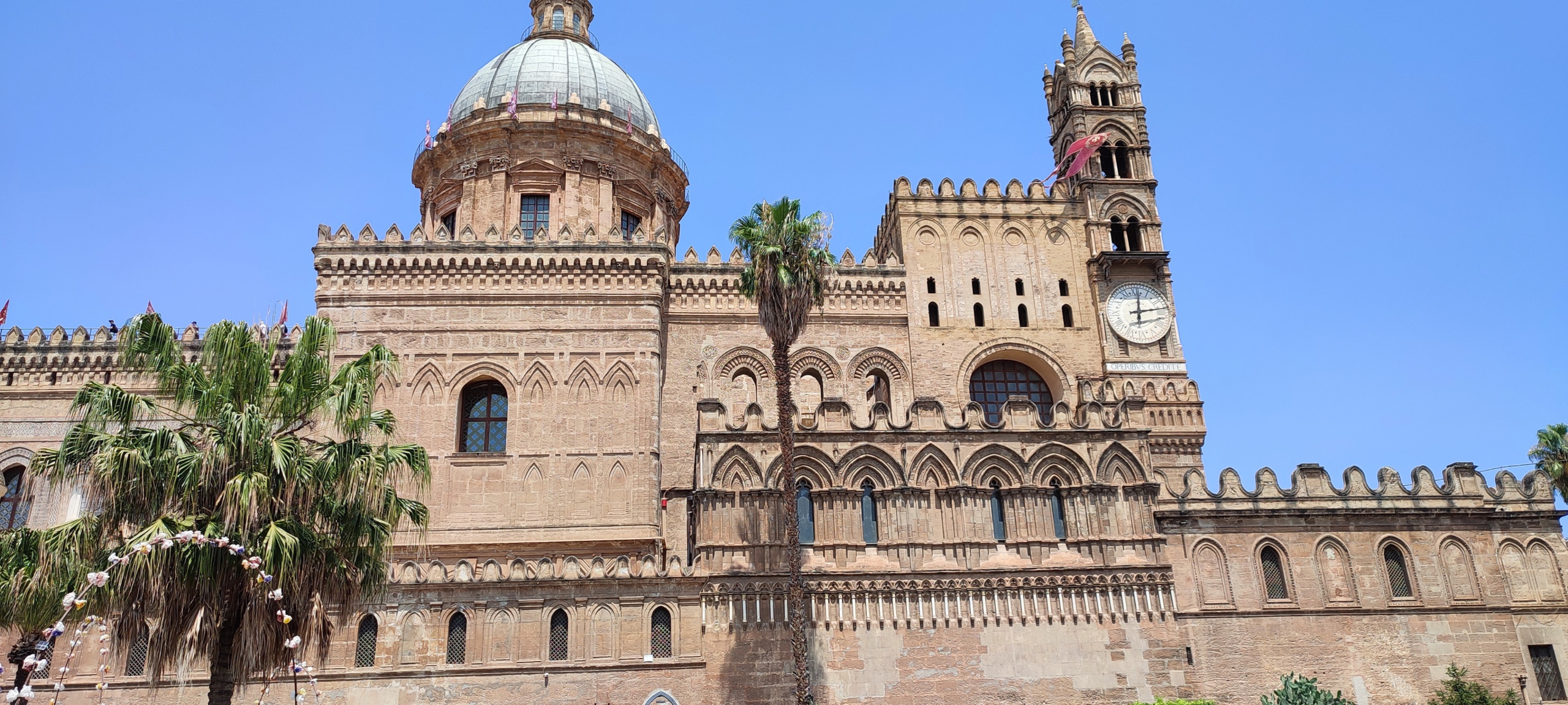 Palermo Cathedral seen from the piazza, with its Norman battlements and bell tower
