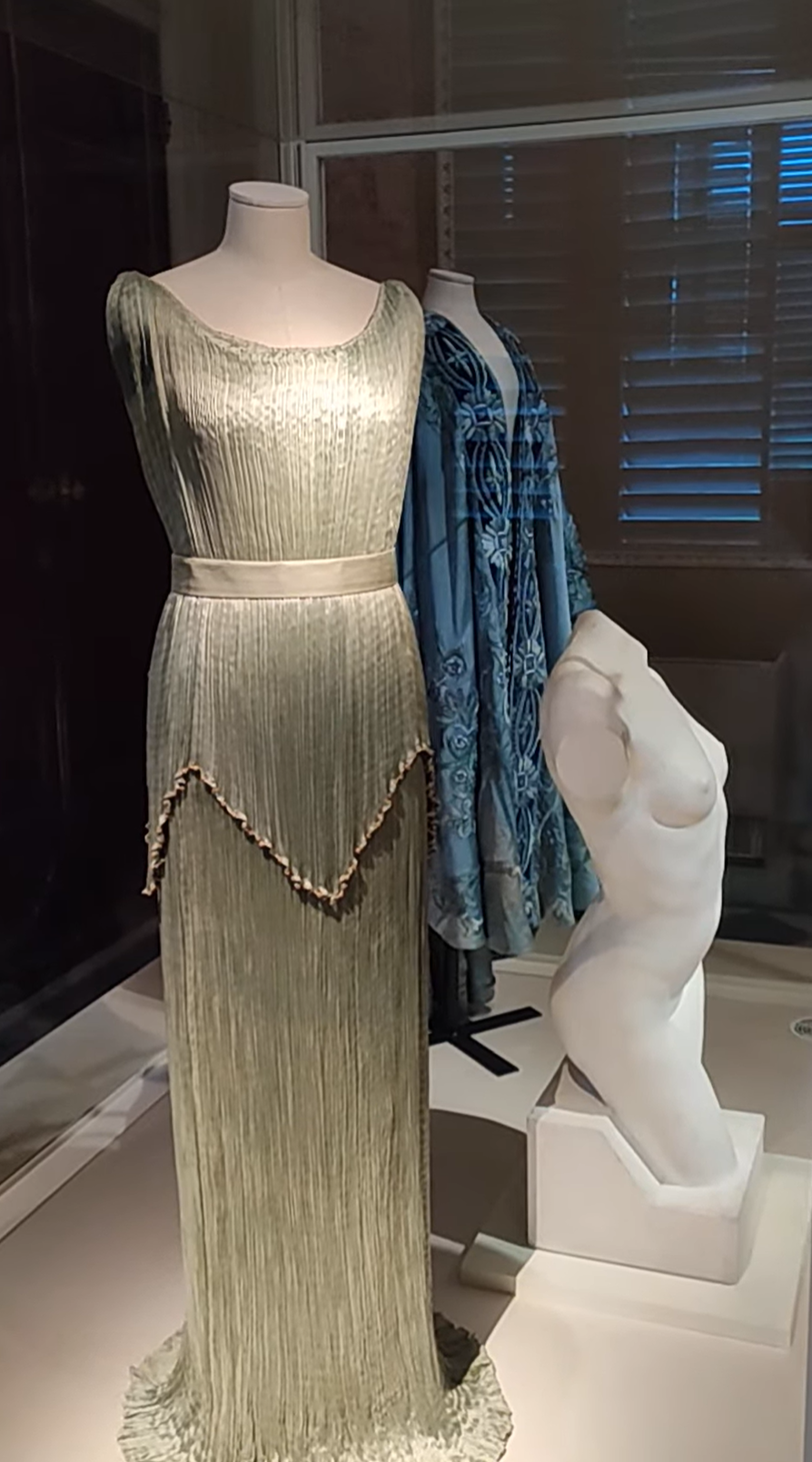 Pleated silk gown and embroidered silk robe on display at the Museum of Costume and Fashion, Palazzo Pitti