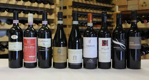 Lineup of Sagrantino di Montefalco DOCG wine bottles from different producers
