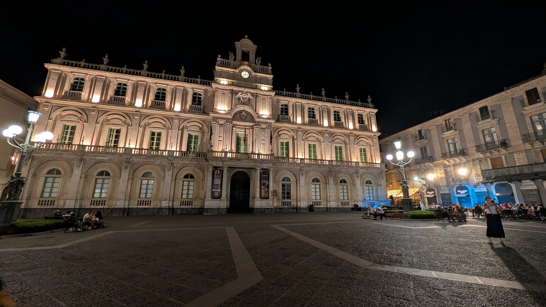 Palazzo dell'Università, the Siculorum Gymnasium, illuminated at night on via Etnea, Catania